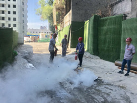 和平小区项目部在施工现场组织了消防应急演练